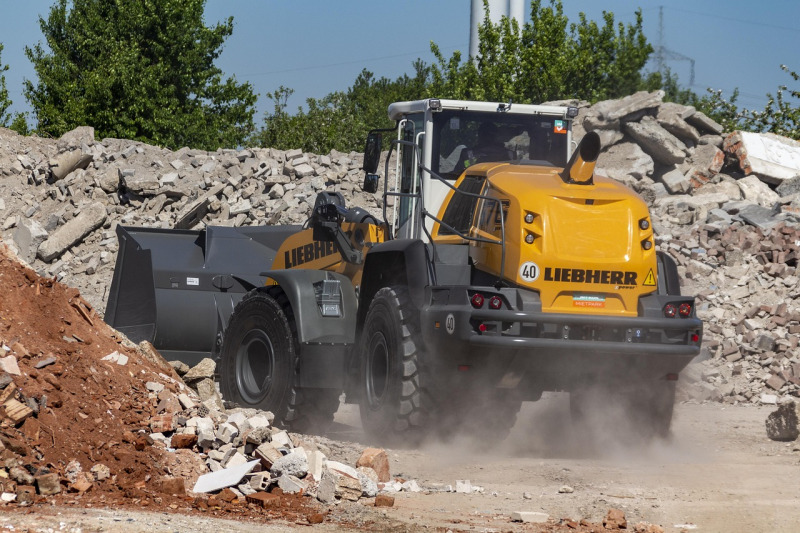 excavator trenching pipe